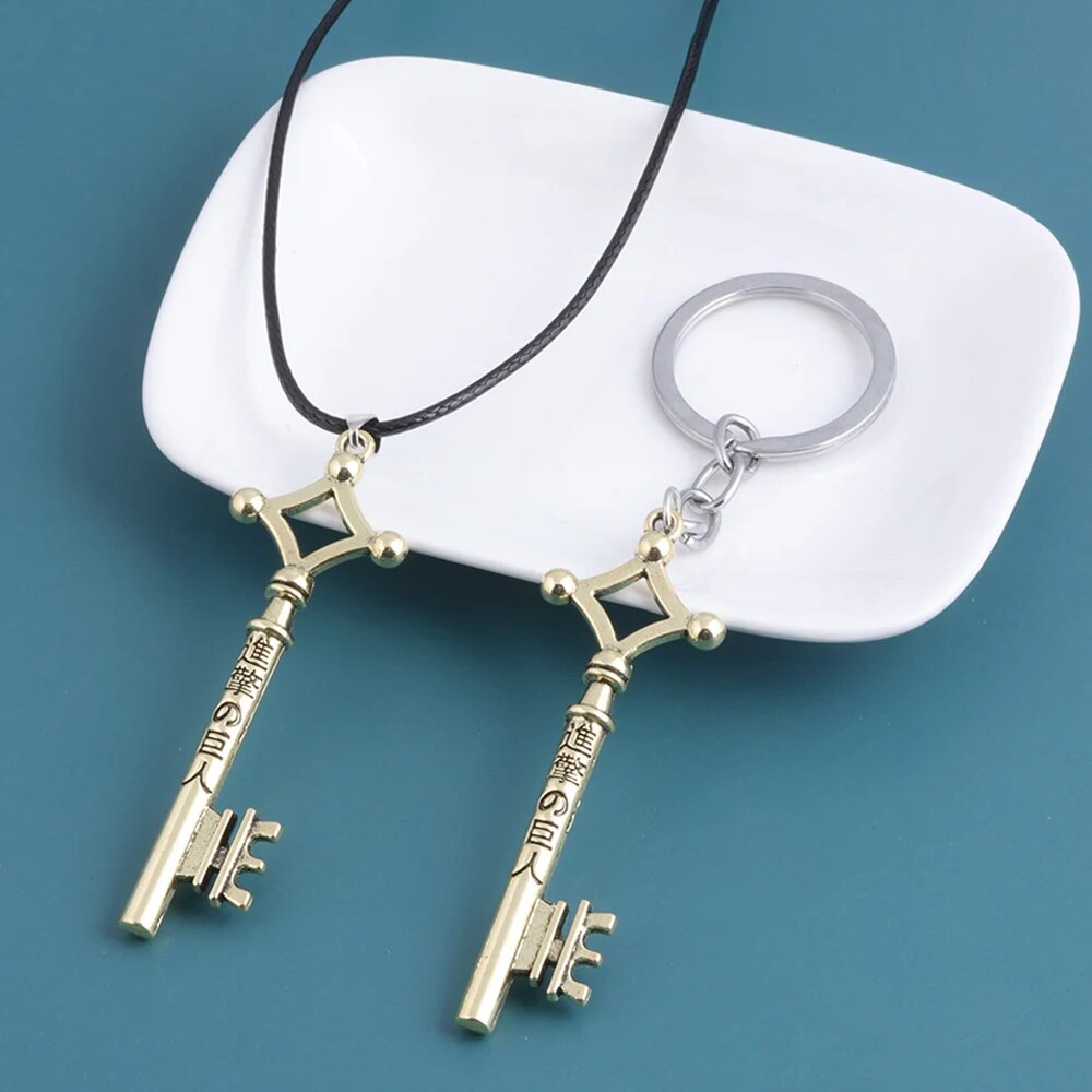 Venta al por mayor, collares de 20 piezas de ataque a los Titanes, alas de la libertad, legión de exploración, Cosplay, collar con colgante de llave Eren para mujeres y hombres