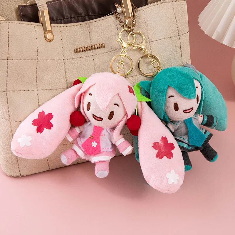 LLavero de felpa Hatsune Miku de 15cm, colgante de bolso de moda, llavero de coche de Anime, muñeca de dibujos animados de doble cola, juguete para niña, llavero de regalo VOCALOID