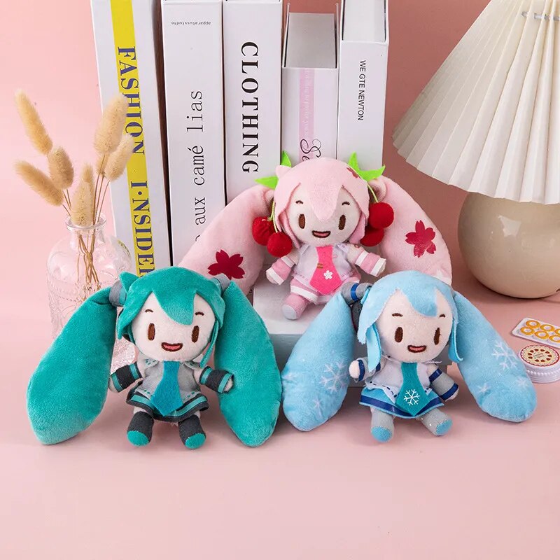 LLavero de felpa Hatsune Miku de 15cm, colgante de bolso de moda, llavero de coche de Anime, muñeca de dibujos animados de doble cola, juguete para niña, llavero de regalo VOCALOID