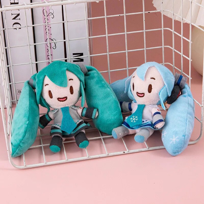 LLavero de felpa Hatsune Miku de 15cm, colgante de bolso de moda, llavero de coche de Anime, muñeca de dibujos animados de doble cola, juguete para niña, llavero de regalo VOCALOID